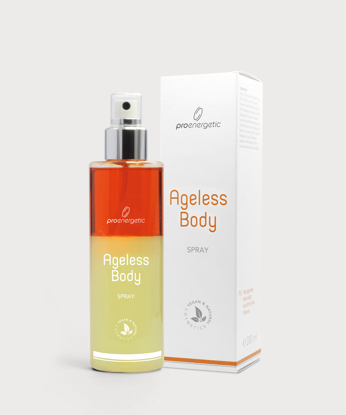 Ageless Body Spray in transparenter Sprühflasche mit silbernem Pumpkopf und zweifarbiger Flüssigkeit in Orange und Gelb, daneben die weiße Produktverpackung mit der Aufschrift „Ageless Body Spray“, vor hellem Hintergrund.