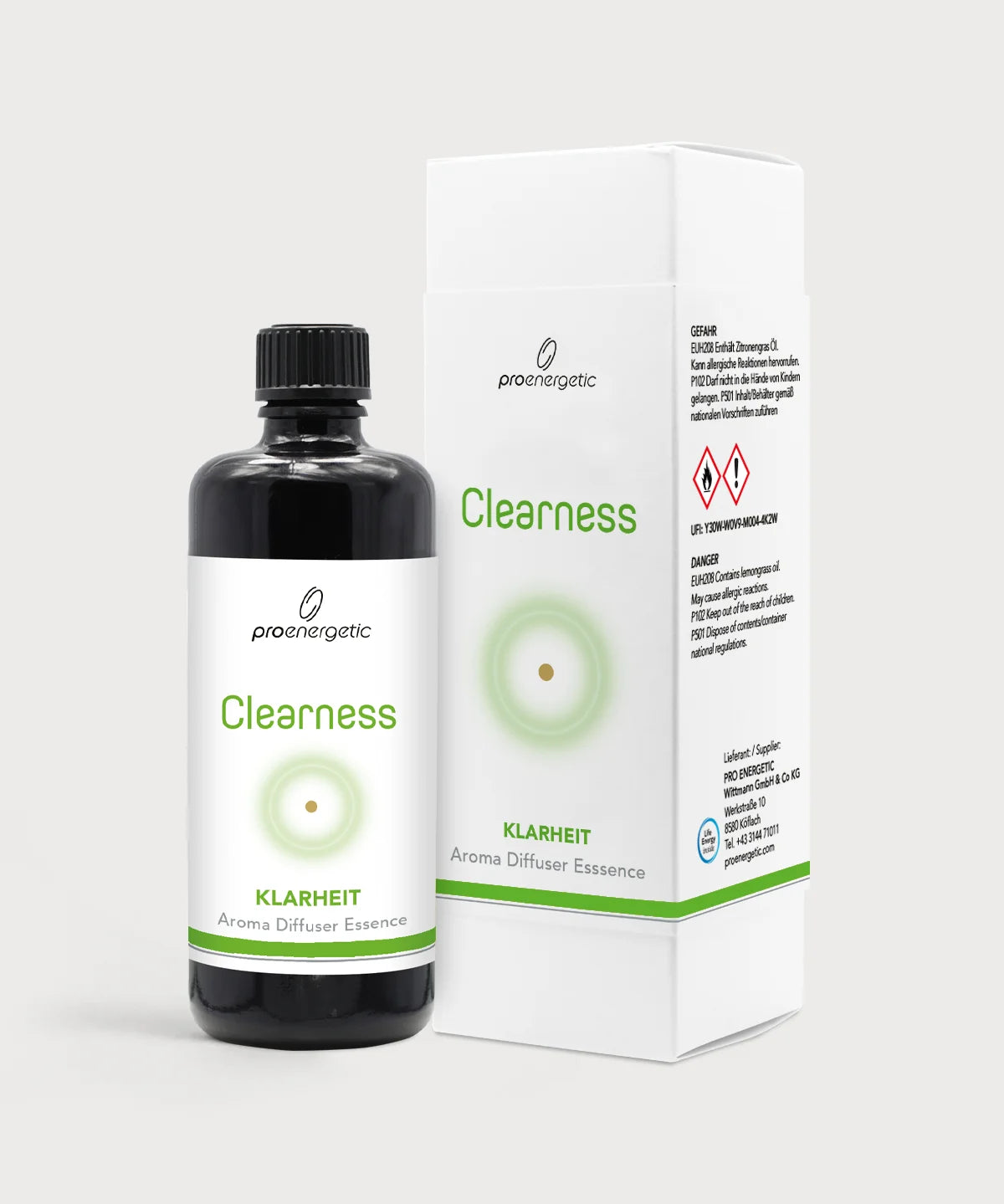 Schwarze ProEnergetic Aroma Diffuser Essence Clearness Flasche neben weißer Produktverpackung mit grünem Akzent, Produktname Clearness und Etikettendetails sichtbar