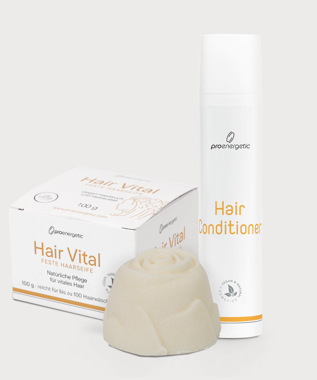 Hair Vital Pflegeritual mit Hair Conditioner und Hair Vital Haarseife mit Produktverpackung auf hellem Hintergrund