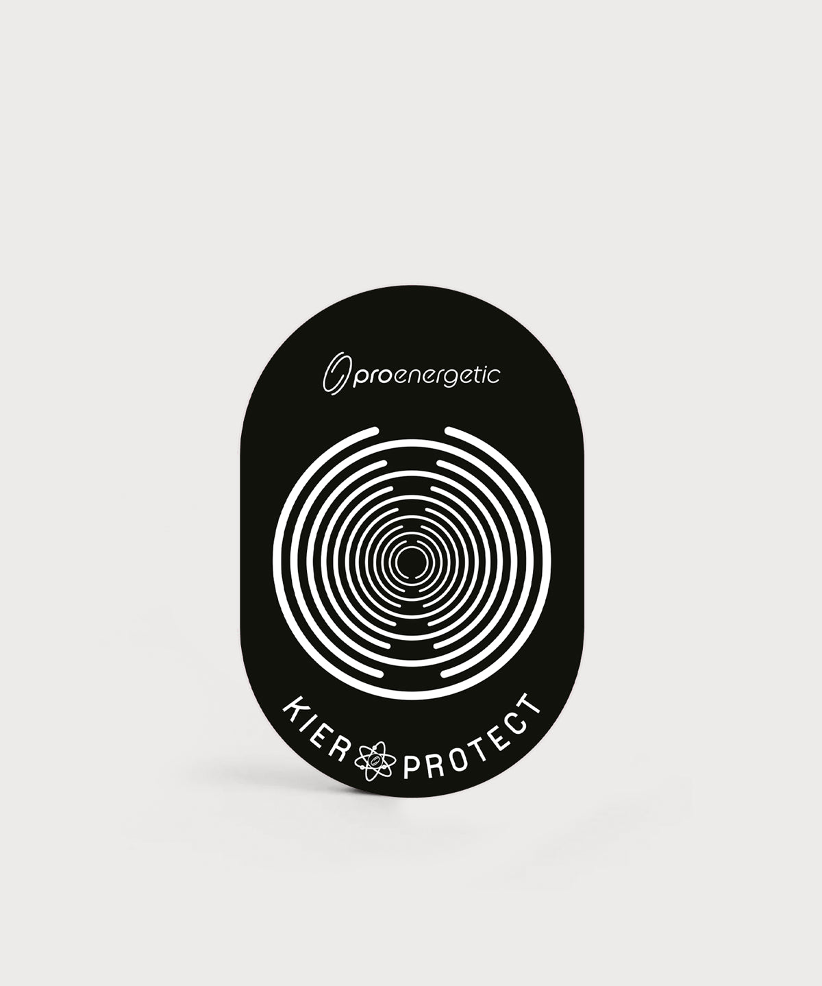 Schwarzes ovales ProEnergetic KIER Protect Home Produkt mit aufgedrucktem Logo, konzentrischem Linienmuster und Schriftzug KIER Protect sichtbar
