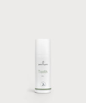 Weißer zylindrischer Spender mit ProEnergetic Logo und Aufschrift Tooth Gel auf hellem Hintergrund.